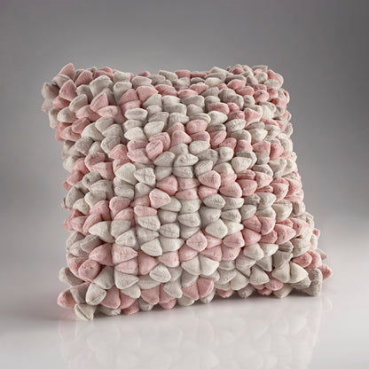 Handcrafted pink and white plush cushion