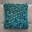 dark teal velvet textured decorative cushion